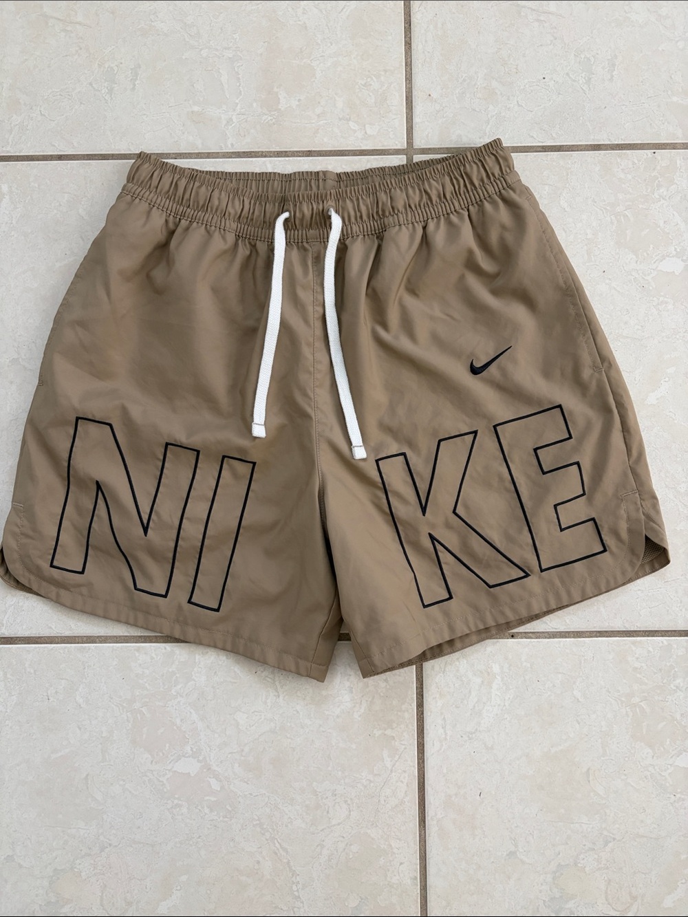 Nike Men's Tan Athletic Shorts with Black Logo